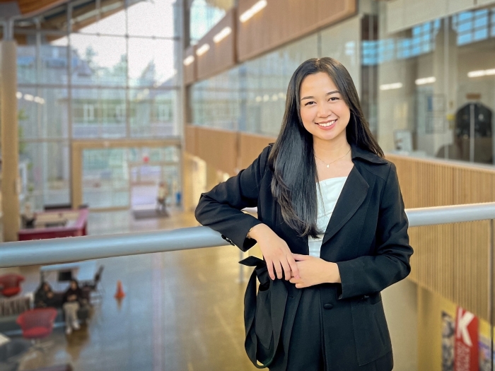 Nhicelee Galapate stands inside KPU Surrey campus