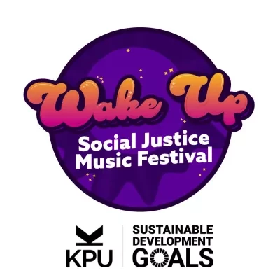 Logo for "Wake Up Social Justice Music Festival" featuring bold orange and white text on a purple circular background with star accents.