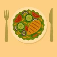 Plate of salad with cucumbers, chicken and tomatoes on a yellow background with a fork and knife beside the plate